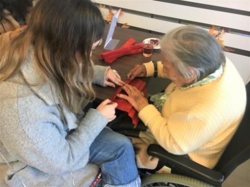 Madame Wahli, discusses (in French, of course!) why the students’ participation at Le Byron Home for the Elderly 